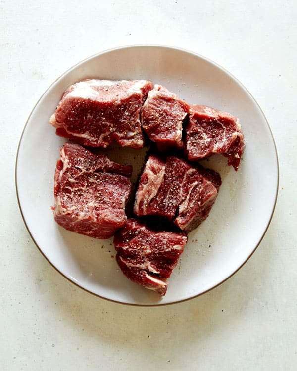 Seasoned chuck beef on a plate.
