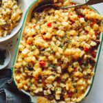 Breakfast casserole with a spoon in it.