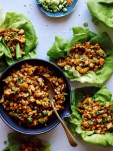 Chicken lettuce wraps with lettuce cups full of the chicken mixture.