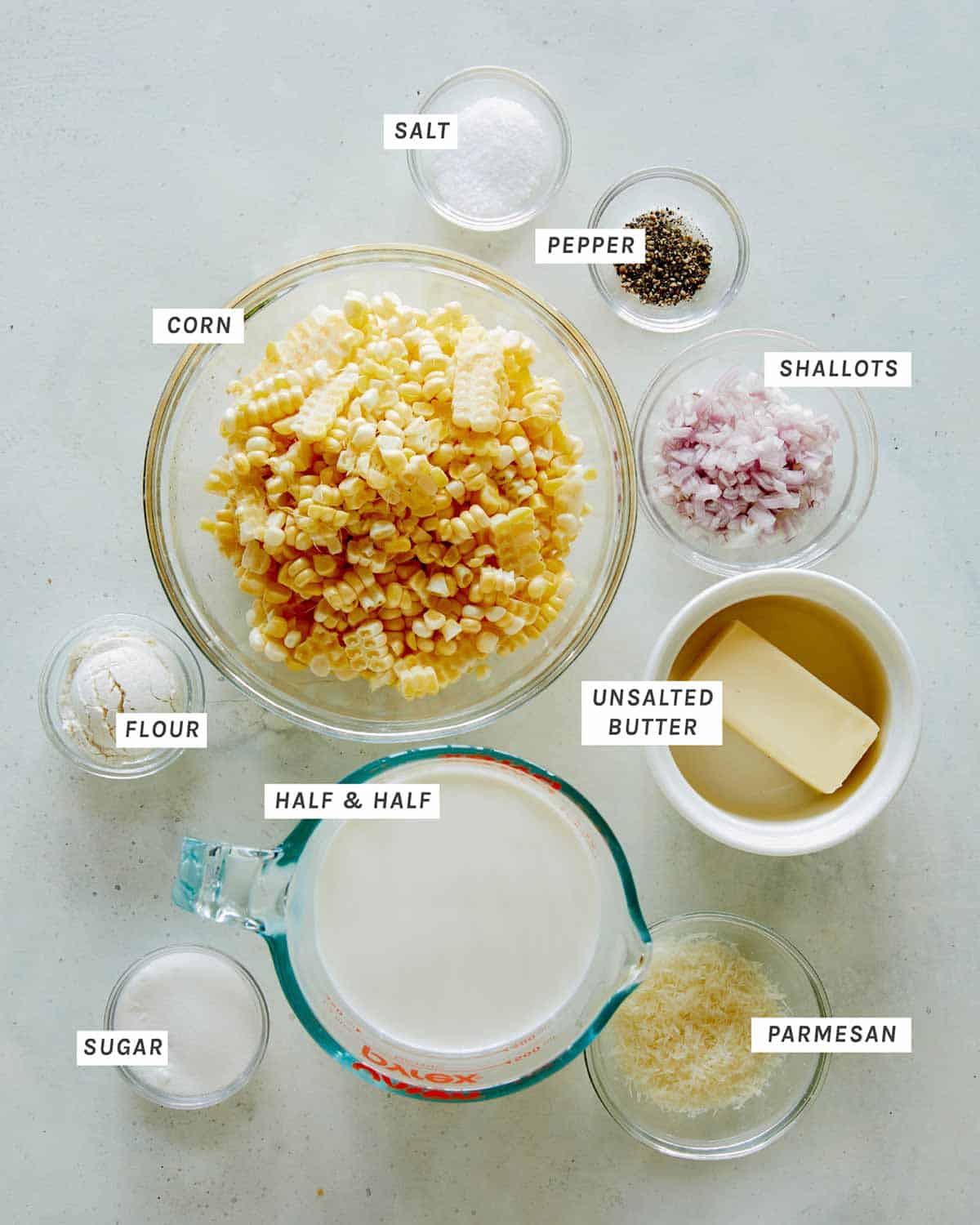 Ingredients for creamed corn all laid out on a kitchen counter. 