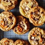 A close up of kitchen sink cookies on a cooling rack.