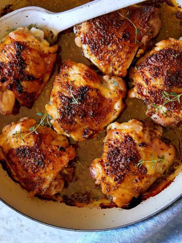 https://www.spoonforkbacon.com/wp-content/uploads/2020/12/oven-baked-chicken-thighs_v6-edited-720x960.jpg