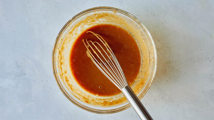 Peanut sauce for a soba noodle recipe in a bowl.