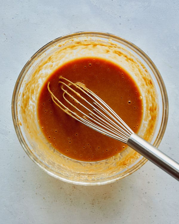 Peanut sauce for a soba noodle recipe in a bowl.