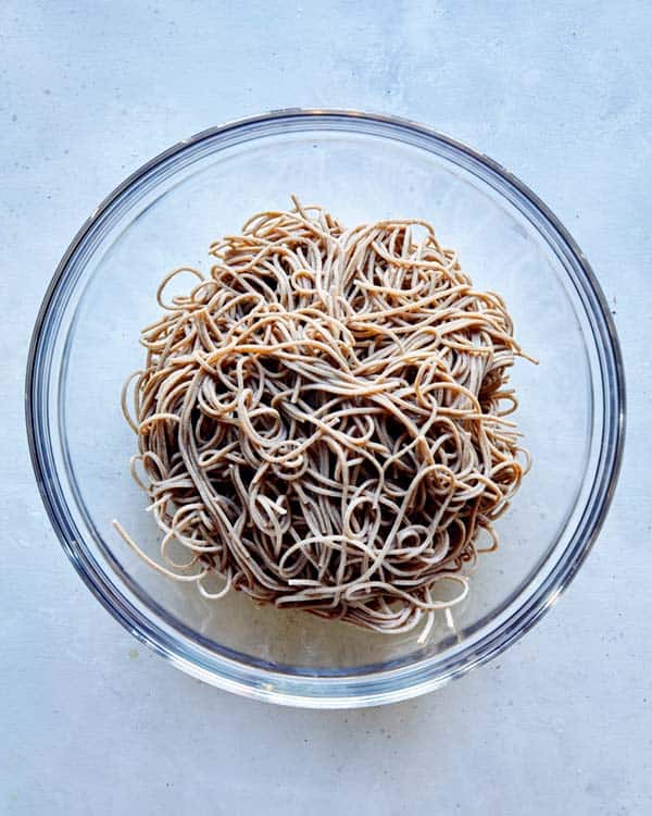 Soba noodles drained and cooked in a bowl. 