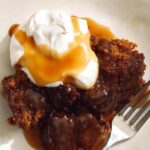 Sticky Toffee pudding recipe in two plates with a fork.