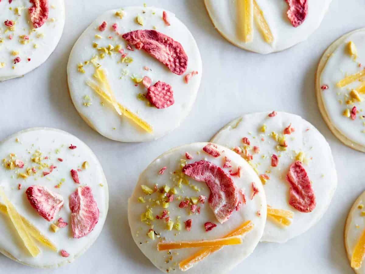 A close up of white chocolate dipped butter cookies.