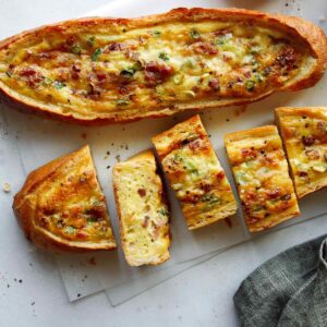 Baked Egg Boats cut up to serve for breakfast.