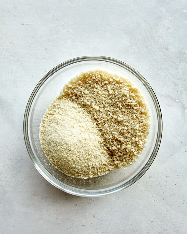 The breading for buffalo cauliflower in a glass bowl.