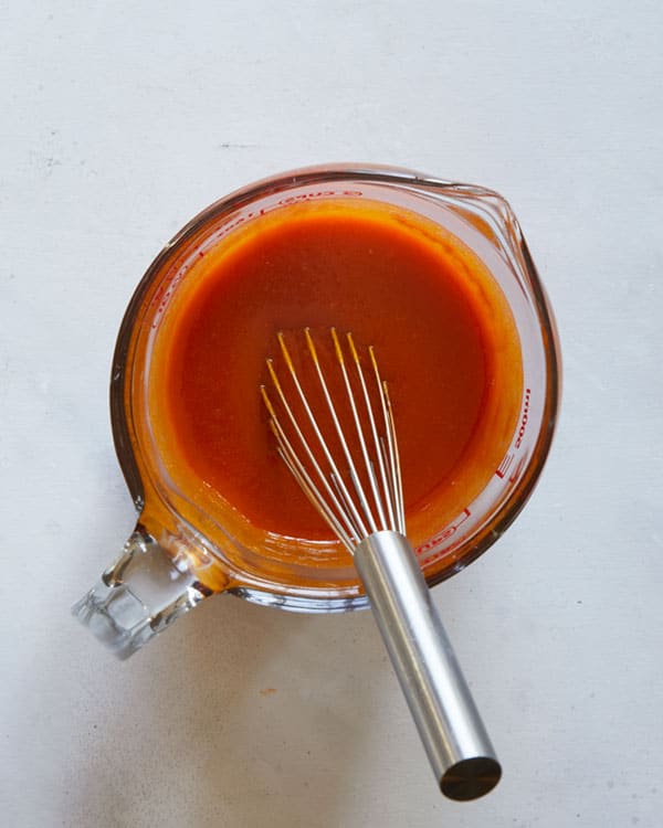 Buffalo sauce mixed together in a bowl.