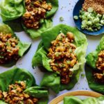 Lettuce cups with chicken filling in them.