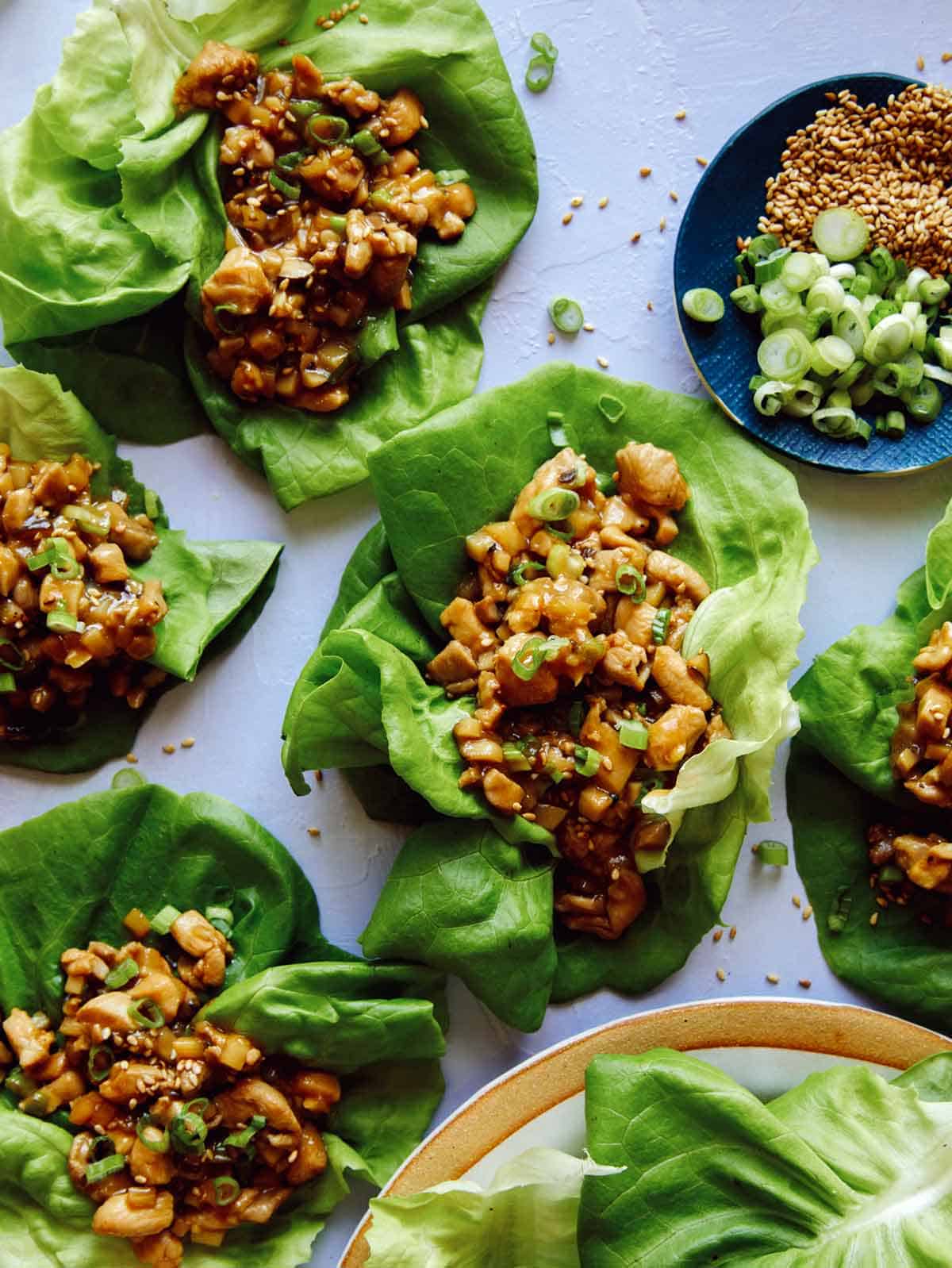 Lettuce cups with chicken filling in them.