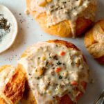 Close up on a bread bowl with clam chowder.