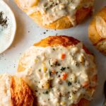 Close up on a bread bowl with clam chowder.