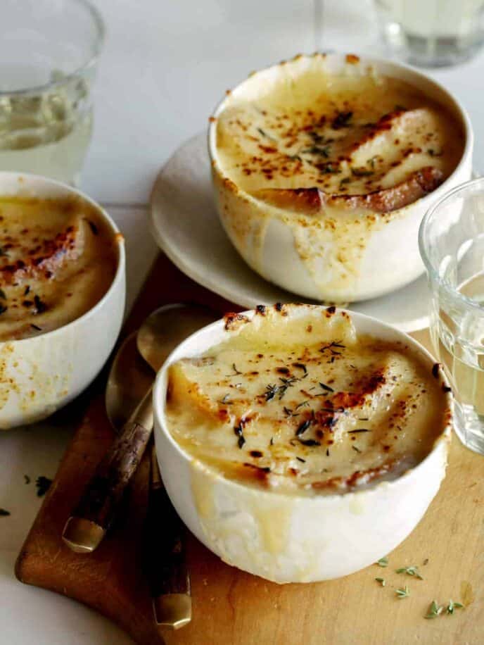 French Onion soup recipe in three bowls.