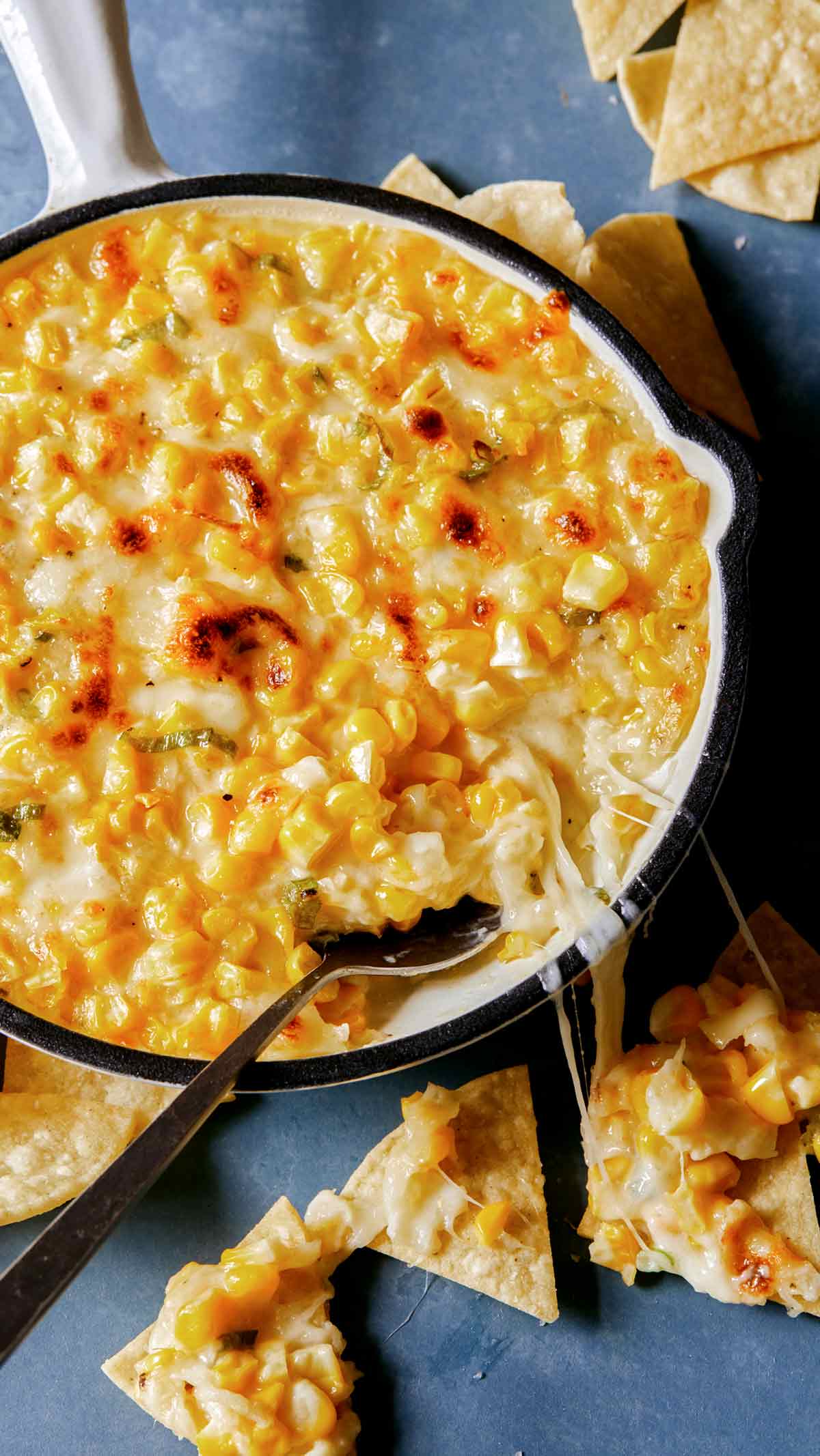 Korean Corn Cheese in a skillet with tortilla chips.