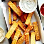 Close up on polenta fries with aioli.