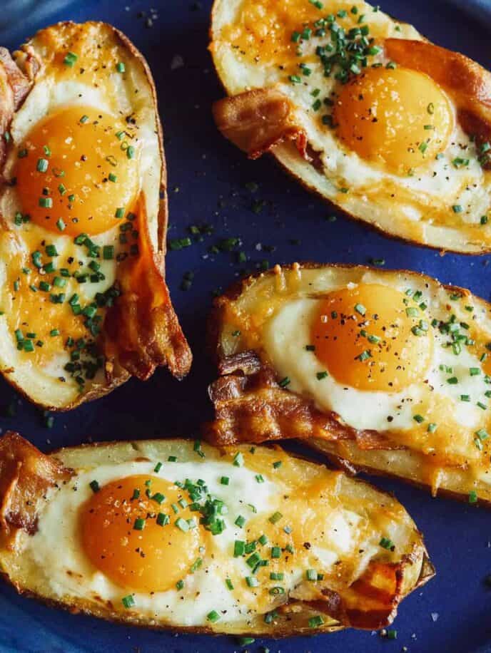 Twice baked breakfast potatoes on a platter.