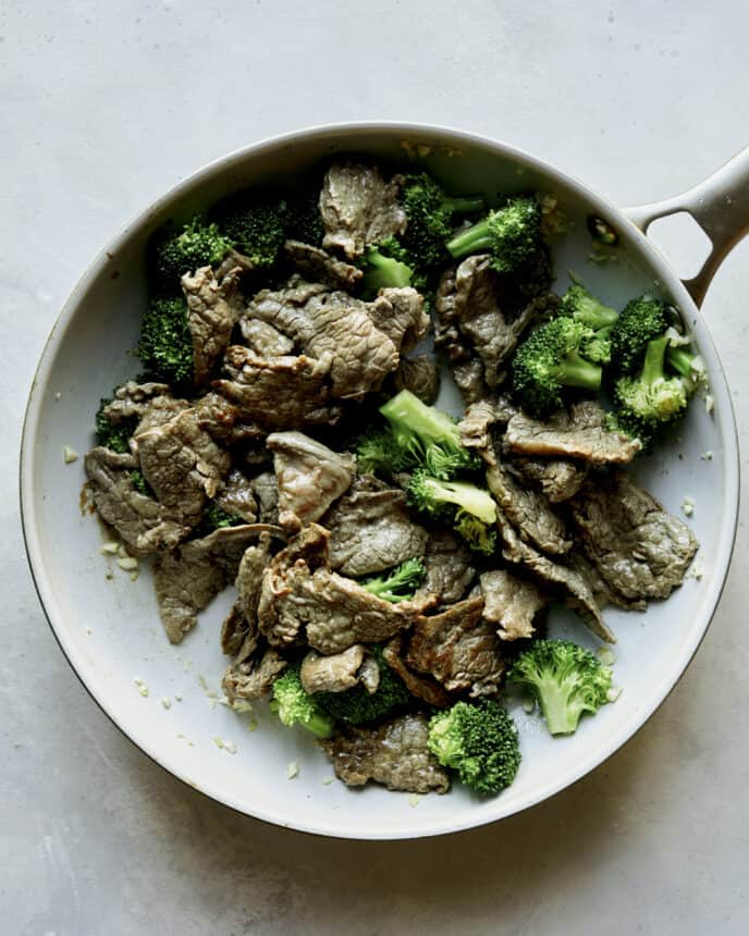 Broccoli and beef in a skillet. 