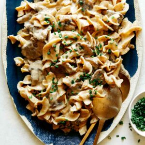 A recipe for Beef Stroganoff on a platter to be served.