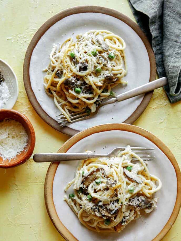 Chicken tetrazzini on two plates.