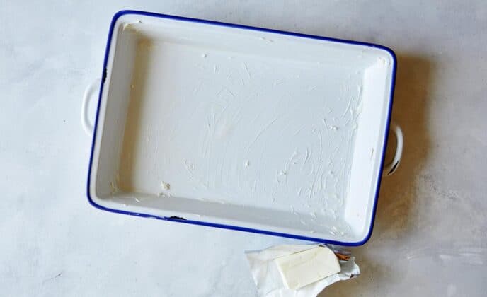 A greased baking dish for chicken tetrazzini.