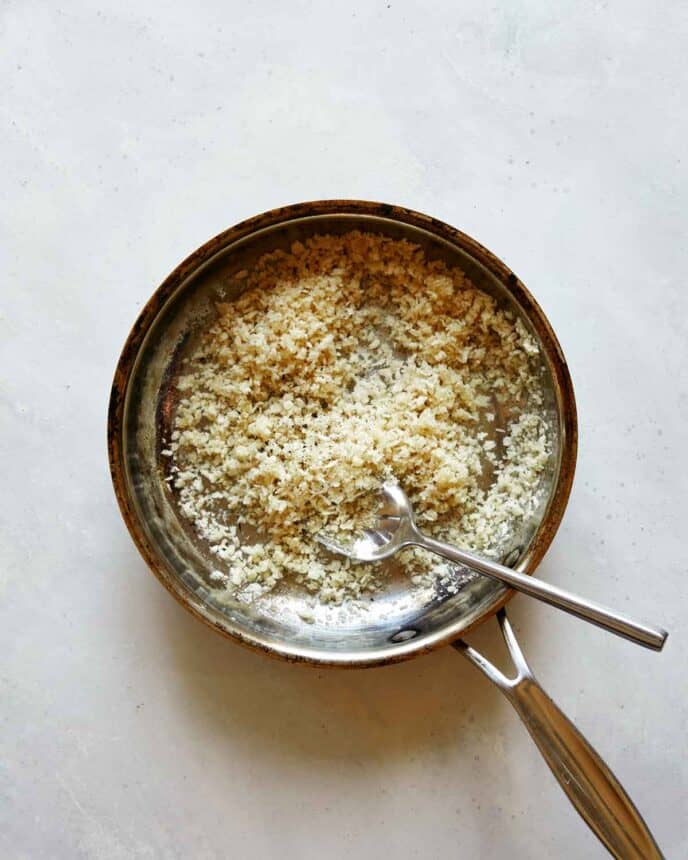 Toasting panko in a skillet with butte.r