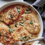 Tuscan chicken recipe in a skillet ready to be served.