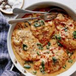 Tuscan chicken recipe in a skillet ready to be served.