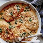 Tuscan chicken recipe in a skillet ready to be served.