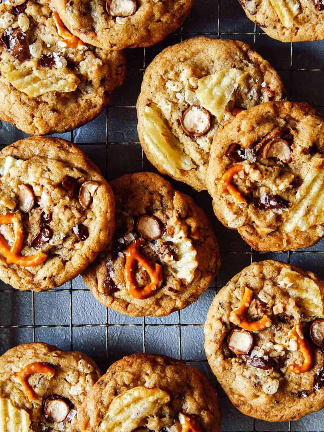 A close up of kitchen sink cookies on a cooling rack.