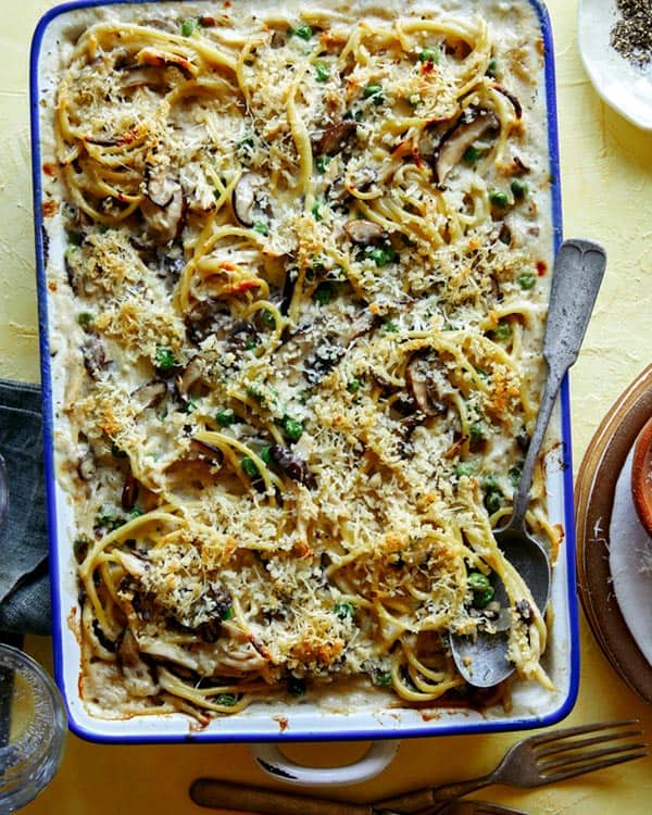 Baked chicken tetrazzini with a spoon in it.