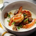 Close up on Shrimp and Grits in a bowl.