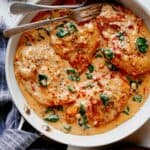 Tuscan chicken recipe in a skillet ready to be served.