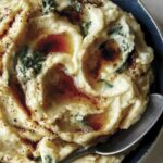 Close up on a bowl of brown butter colcannon.