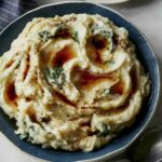 A recipe for Brown butter Colcannon in a bowl.