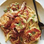 Cajun shrimp pasta recipe in a bowl.