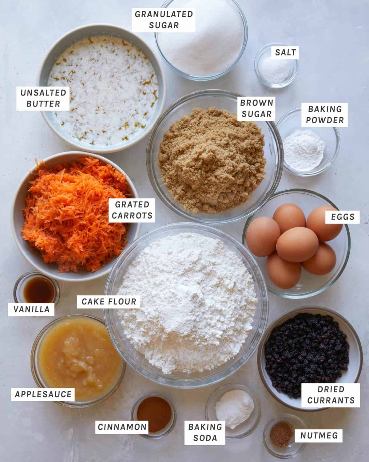 Ingredients for carrot cake on a kitchen counter. 