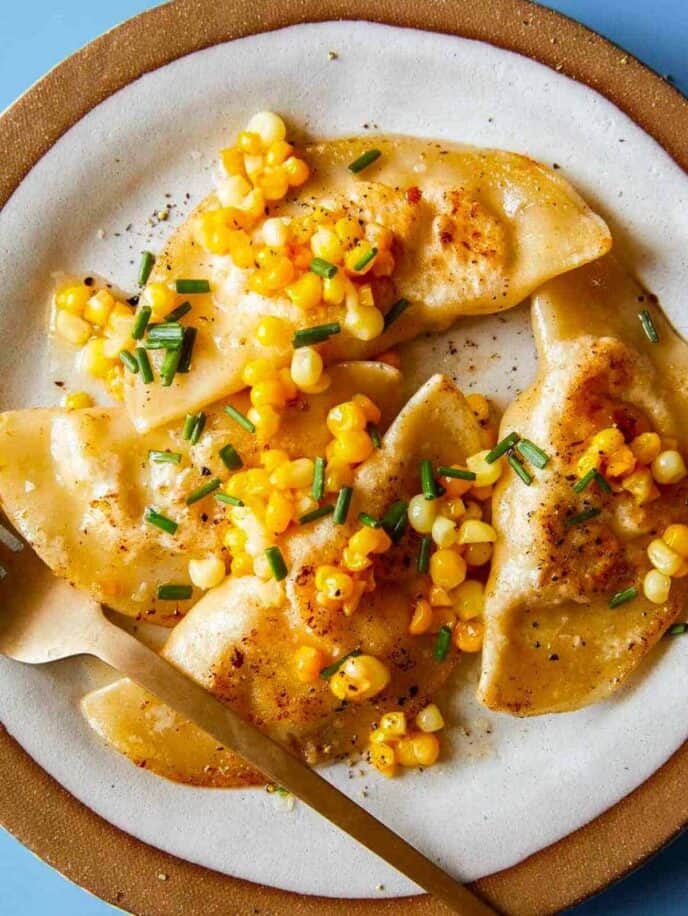 Shrimp and corn ravioli on a plate. 