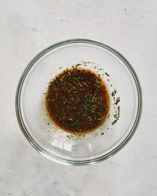 Lamb chop rub in a glass bowl.