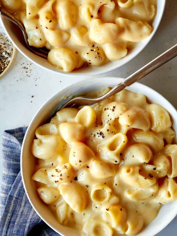 Two bowls of stovetop mac and cheese.