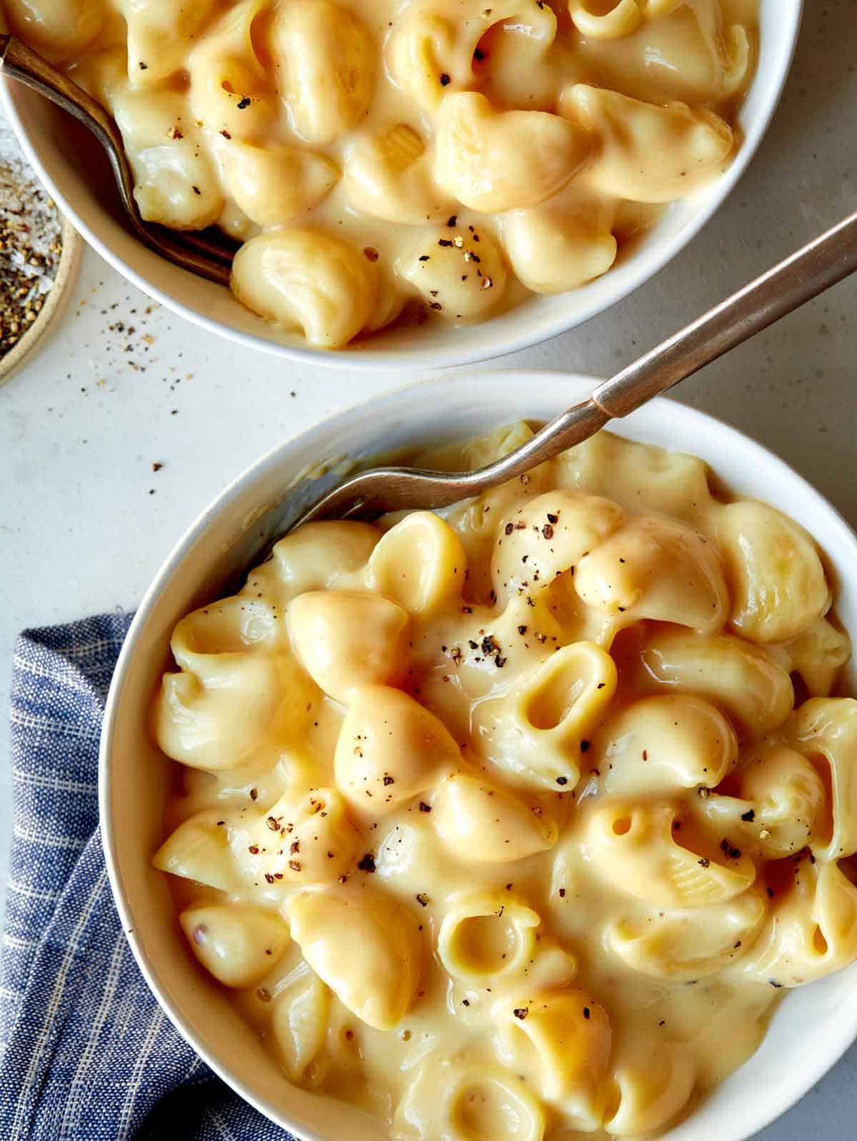 Two bowls of stovetop mac and cheese. 