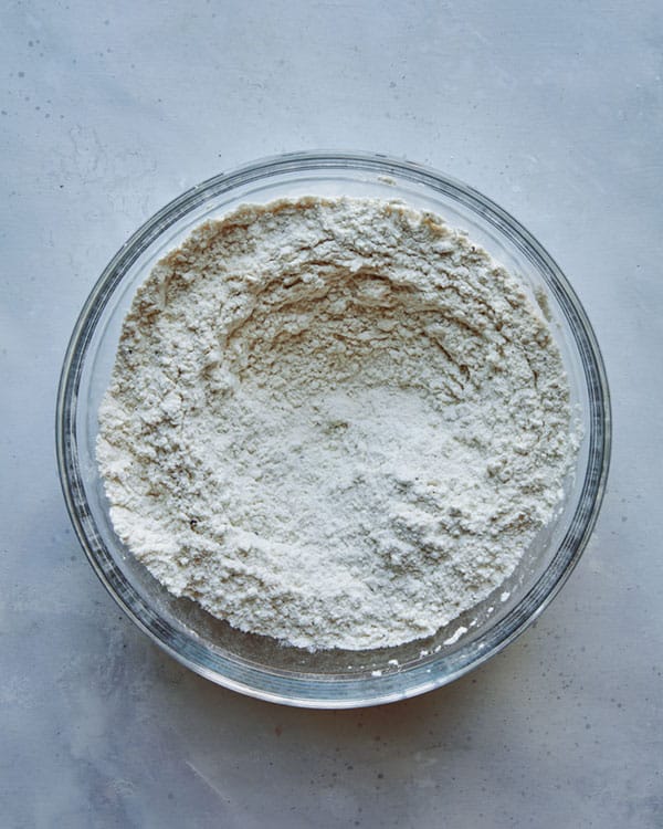 Dry ingredients for drop biscuit recipe in a bowl whisked together.