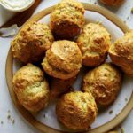 A recipe for drop biscuits on a plate.