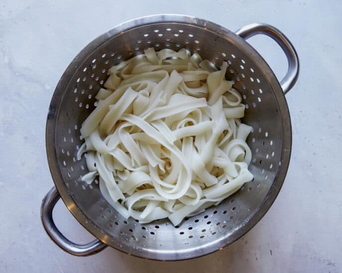 Pad see ew noodles cooked and drained.