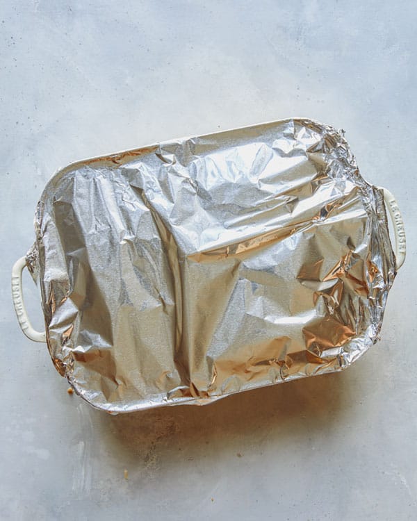 Sausage strata wrapped in foil to be baked.