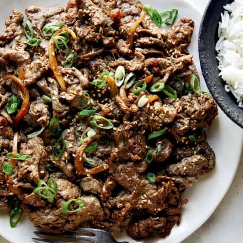 Beef bulgogi recipe on a plate with rice.