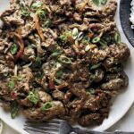 Beef bulgogi recipe on a plate with rice.