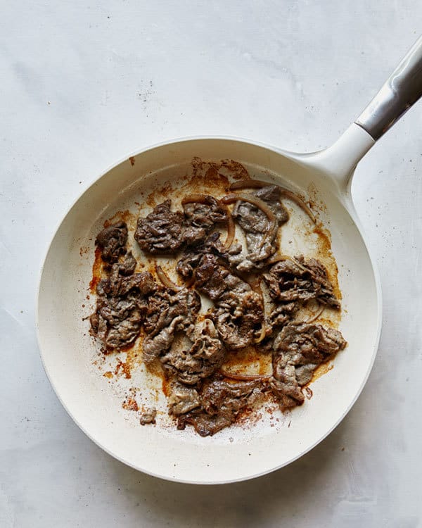 Cooked beef bulgogi in a skillet.