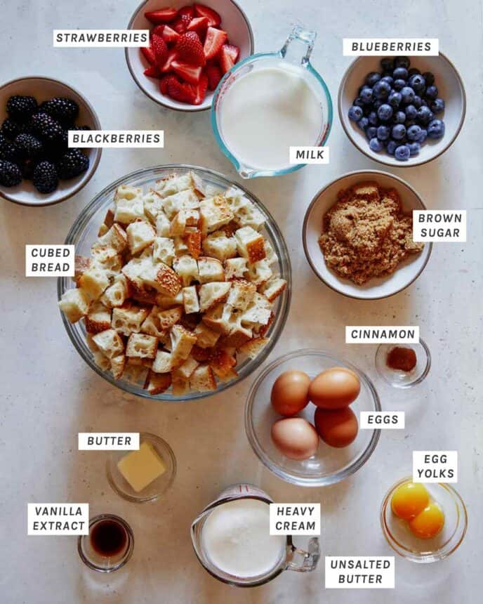Ingredients to make bread pudding with berries.